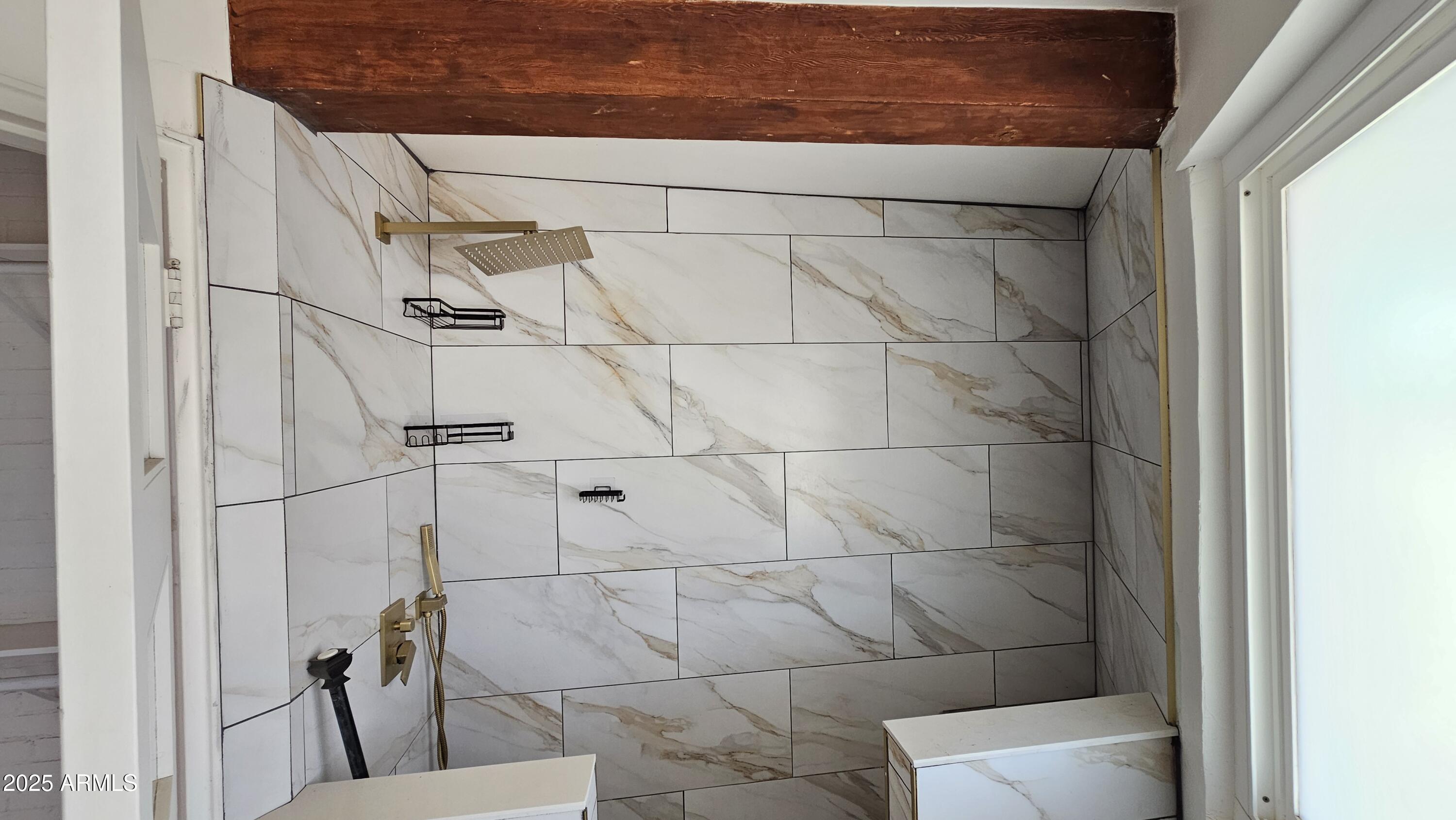 9220 North Diffin Road Florence, AZ 85132 - Photo 4 of 9 a bathroom with a shower