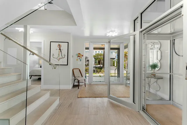 a view of entryway with wooden floor