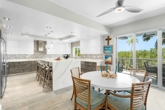 a view of a kitchen with kitchen sink and a window