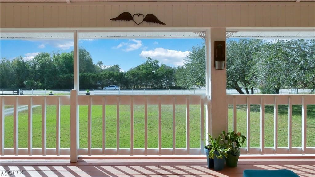 11751 Shawnee Road Fort Myers, FL 33913 - Photo 14 of 32 a view of a balcony with lake view