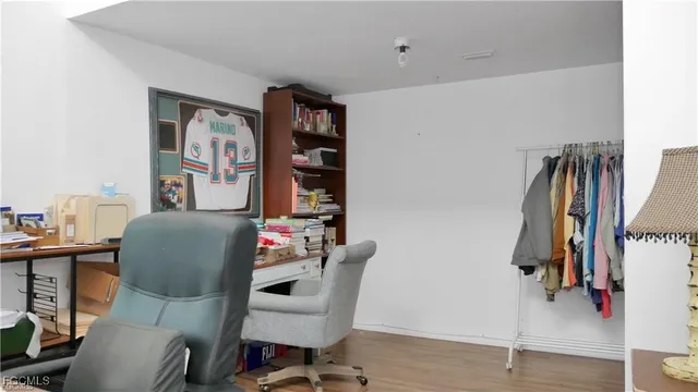 a bedroom with a bed and a fireplace