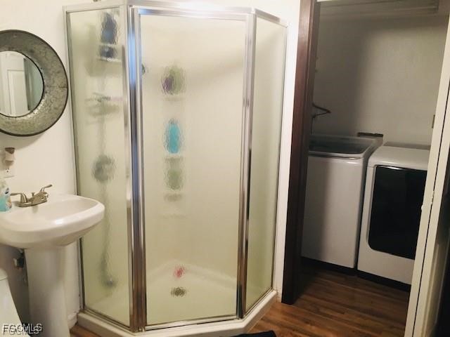 11751 Shawnee Road Fort Myers, FL 33913 - Photo 25 of 32 a bathroom with a sink and a mirror