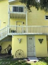 11751 Shawnee Road Fort Myers, FL 33913 - Photo 28 of 32 a front view of a house with a large window