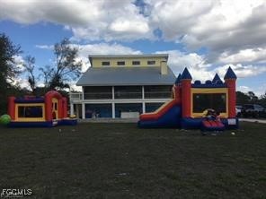 11751 Shawnee Road Fort Myers, FL 33913 - Photo 30 of 32 a view of house with outdoor space and deck