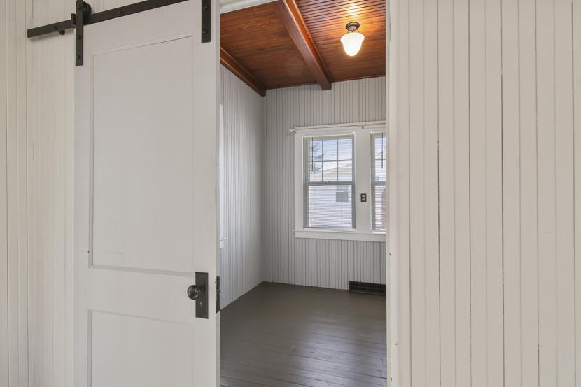 3 Ash Street Wareham, MA 02571 - Photo 12 of 22 a view of an empty room with wooden floor and windows