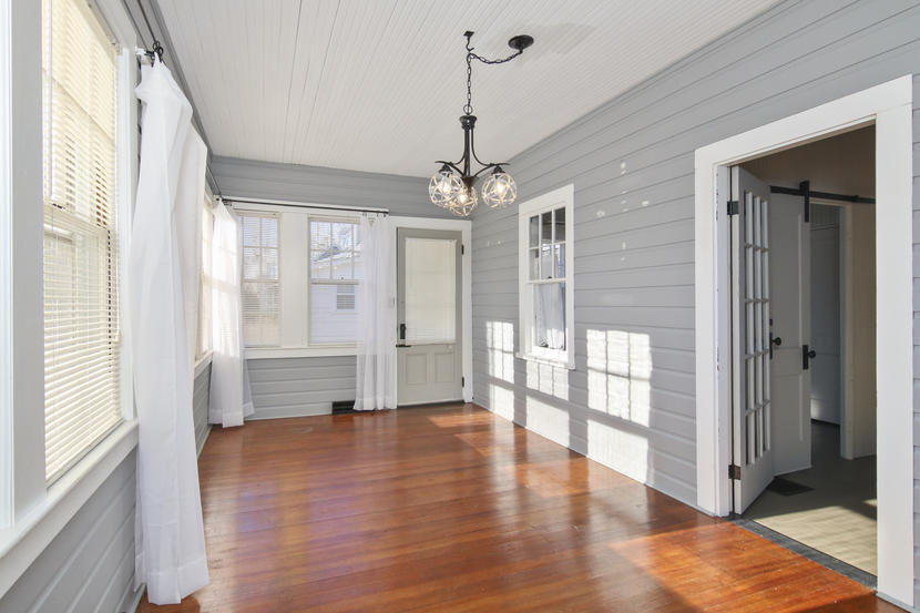 3 Ash Street Wareham, MA 02571 - Photo 2 of 22 a view of a big room with wooden floor windows and a chandelier