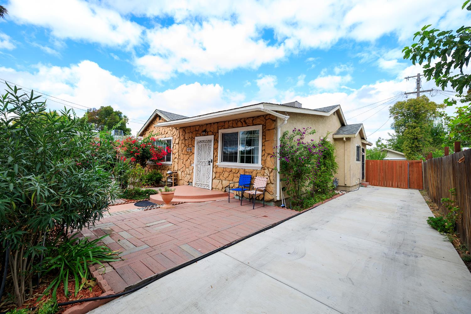 421 East 8th Street Stockton, CA 95206 - Photo 2 of 20 a view of a house with backyard and sitting area