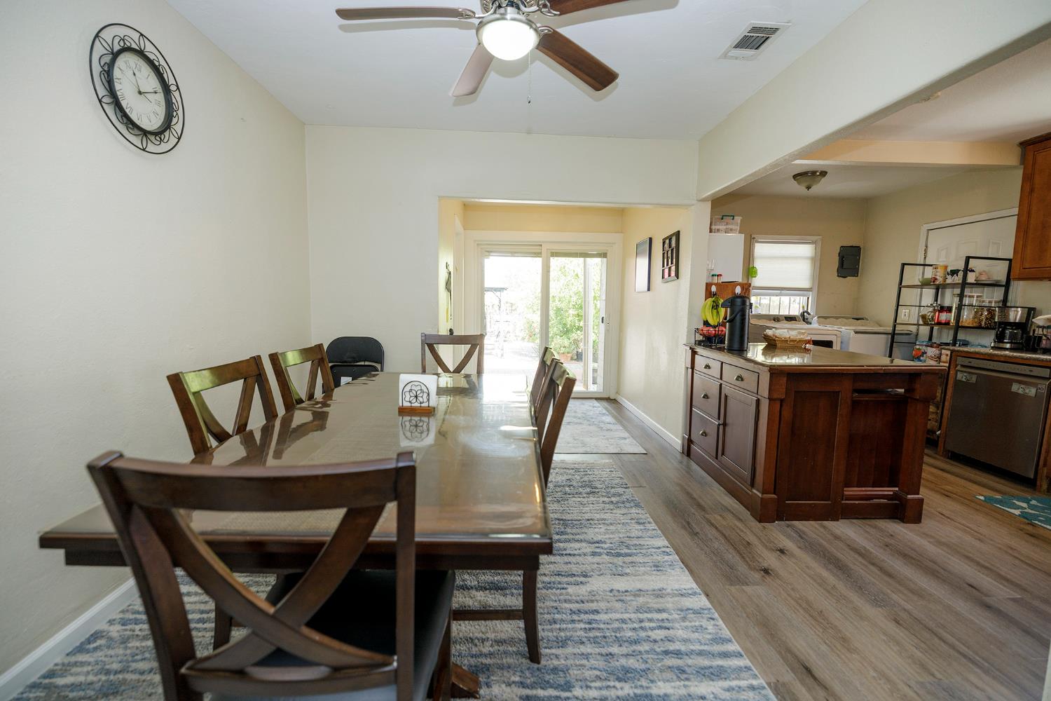 421 East 8th Street Stockton, CA 95206 - Photo 9 of 20 a view of a dining room with furniture and wooden floor