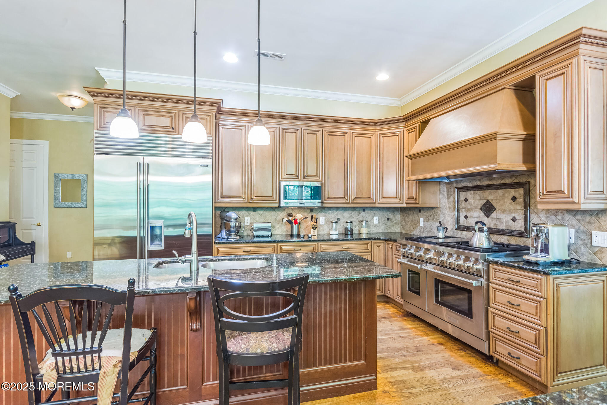 458 Cherry Hill Road Princeton, NJ 08540 - Photo 25 of 50 a kitchen with stainless steel appliances granite countertop a stove a sink and cabinets