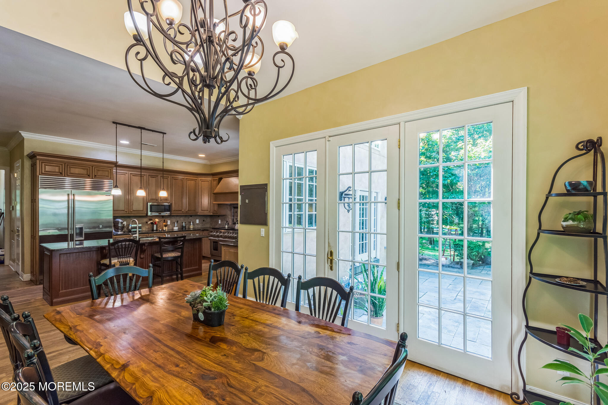 458 Cherry Hill Road Princeton, NJ 08540 - Photo 29 of 50 a dining room with furniture a chandelier and wooden floor