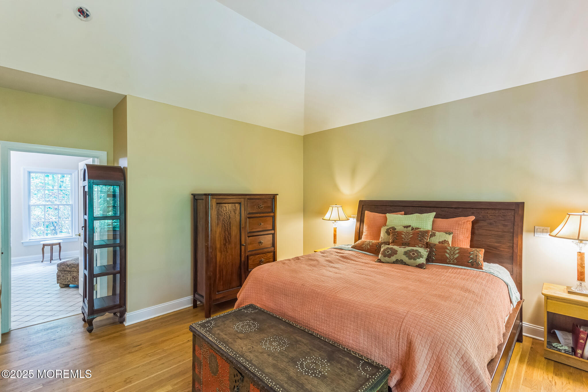 458 Cherry Hill Road Princeton, NJ 08540 - Photo 31 of 50 a bedroom with a bed and wooden floor