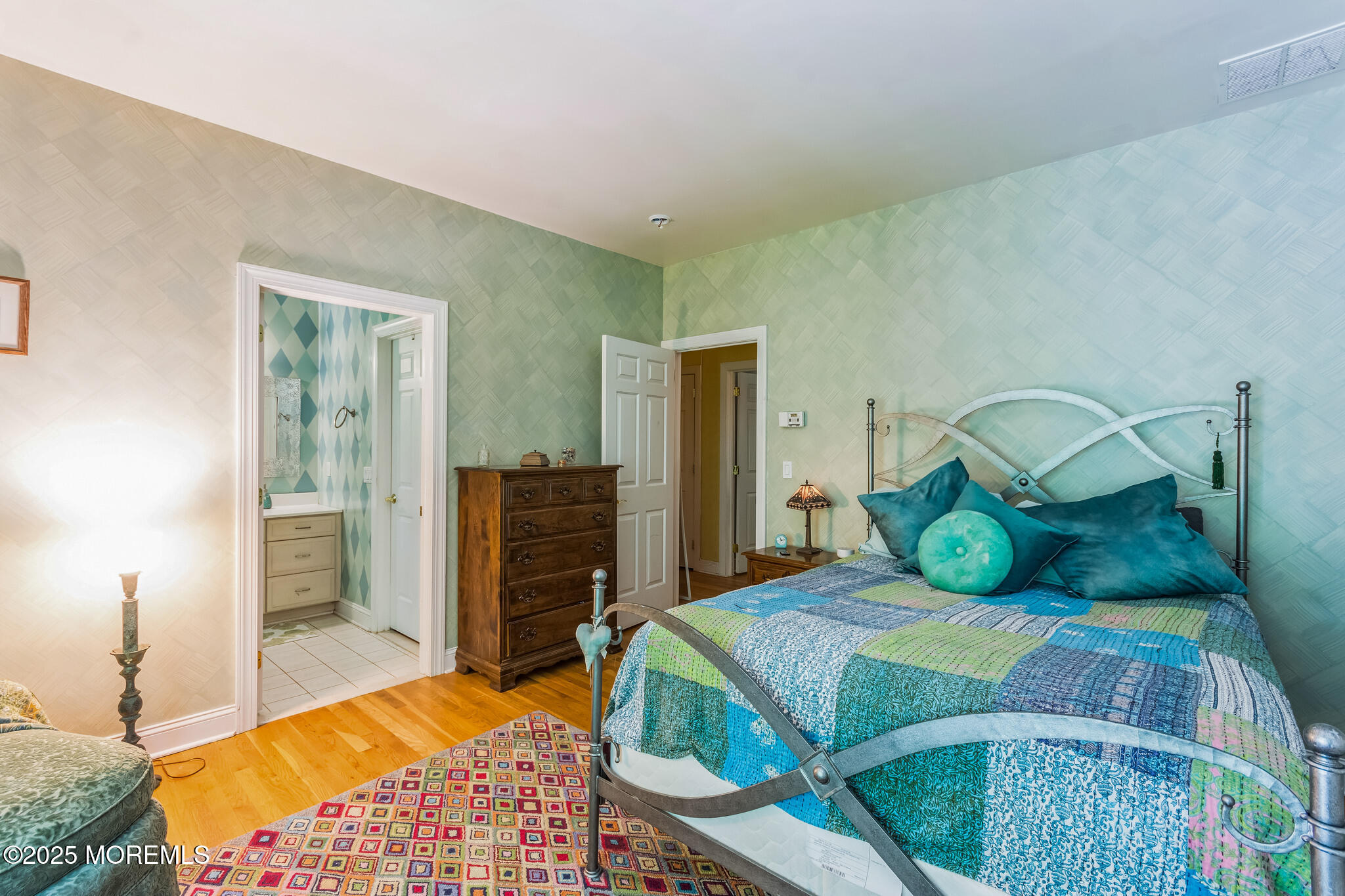 458 Cherry Hill Road Princeton, NJ 08540 - Photo 32 of 50 a bedroom with a bed and wooden floor