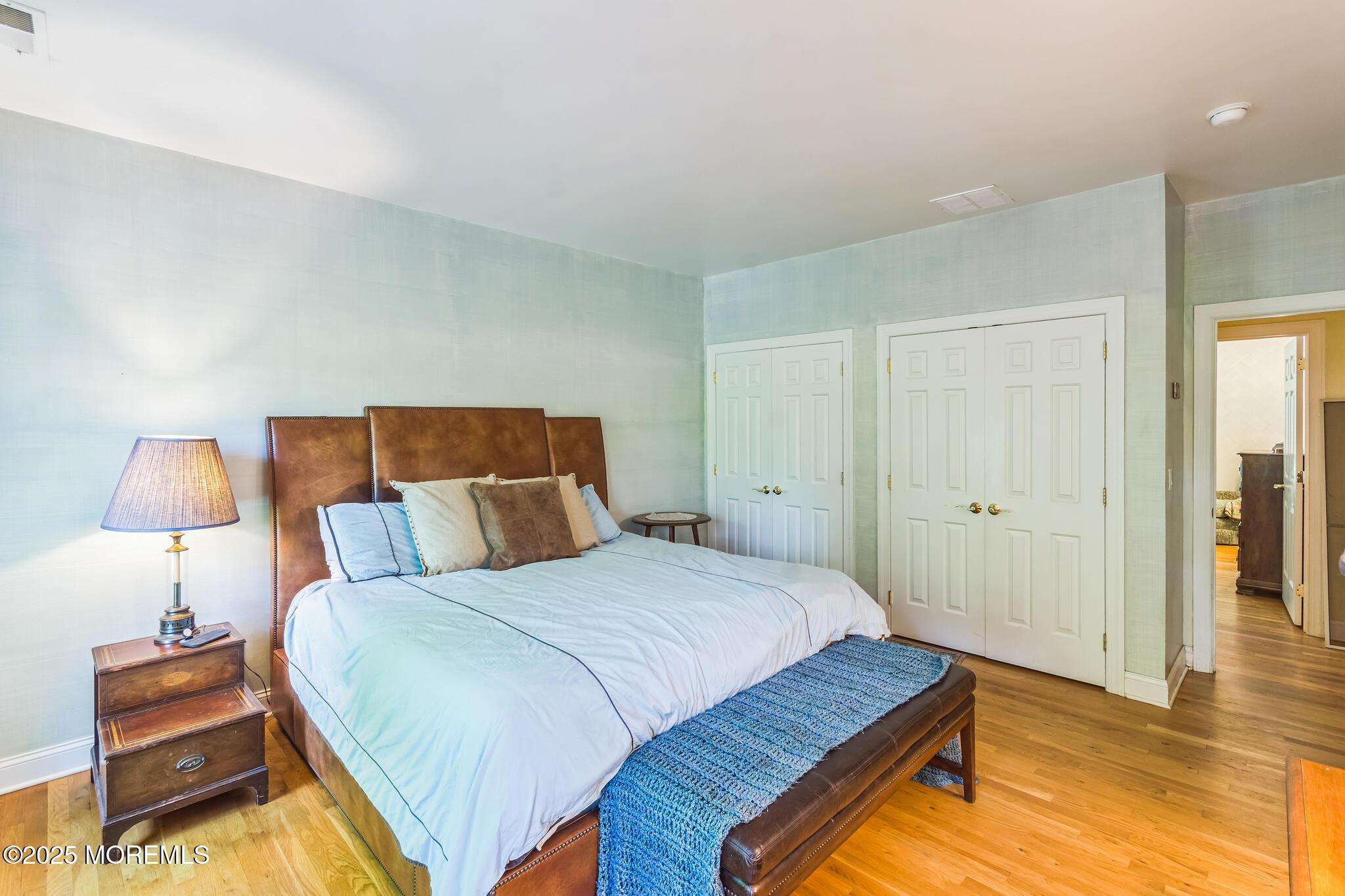 458 Cherry Hill Road Princeton, NJ 08540 - Photo 35 of 50 a bedroom with a bed and a lamp