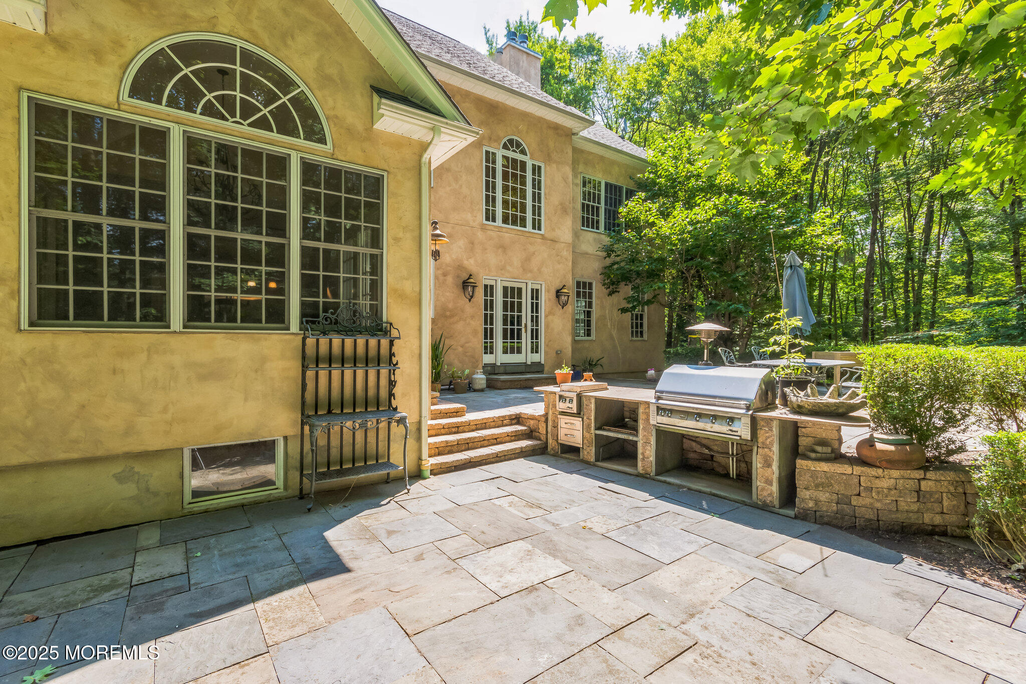 458 Cherry Hill Road Princeton, NJ 08540 - Photo 4 of 50 a view of a patio with a table and chairs