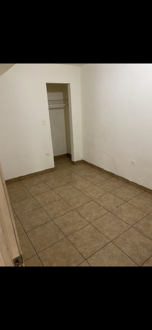 1808 South Drake Avenue Chicago, IL 60623 - Photo 14 of 14 a view of an empty room