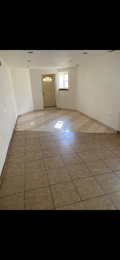 1808 South Drake Avenue Chicago, IL 60623 - Photo 8 of 14 a view of empty room