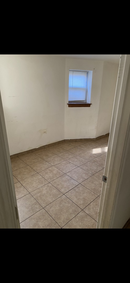 1808 South Drake Avenue Chicago, IL 60623 - Photo 9 of 14 a view of a room