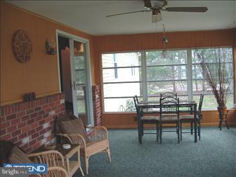 4435 Church Road Mount Laurel, NJ 08054 - Photo 5 of 6 a view of a room with furniture and a window