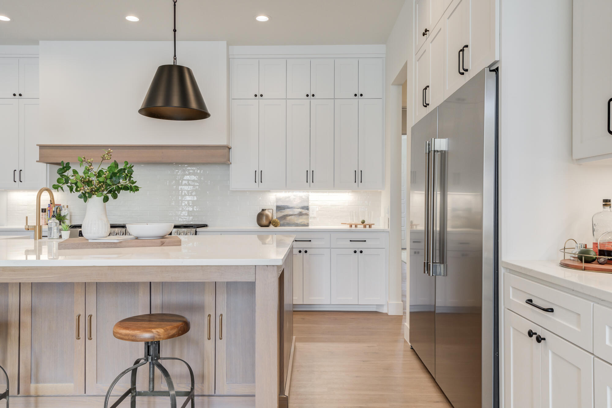 3608 144th Street Lubbock, TX 79423 - Photo 13 of 51 a kitchen with stainless steel appliances granite countertop a refrigerator and a sink