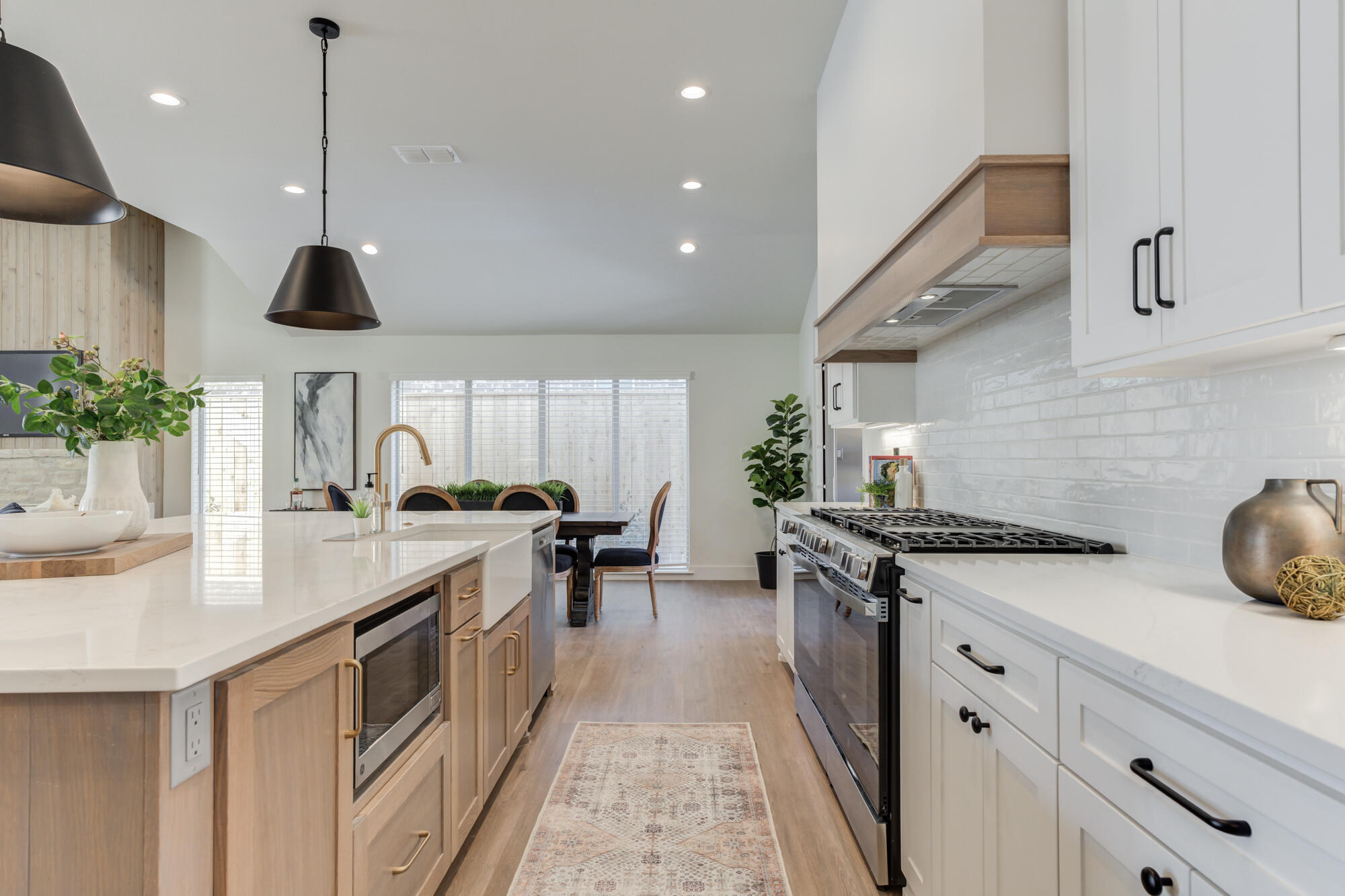 3608 144th Street Lubbock, TX 79423 - Photo 15 of 51 a kitchen with a sink and stove