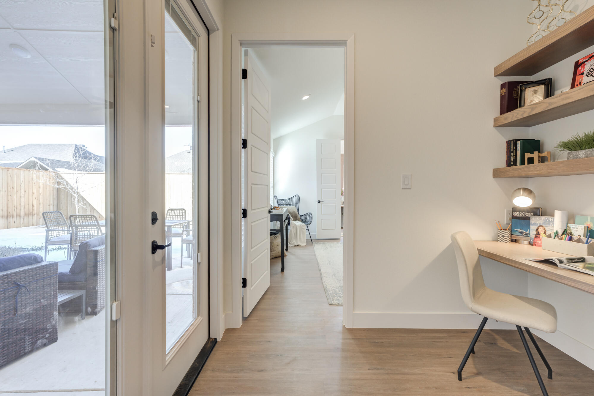 3608 144th Street Lubbock, TX 79423 - Photo 22 of 51 a very nice looking room with a large window and wooden floor