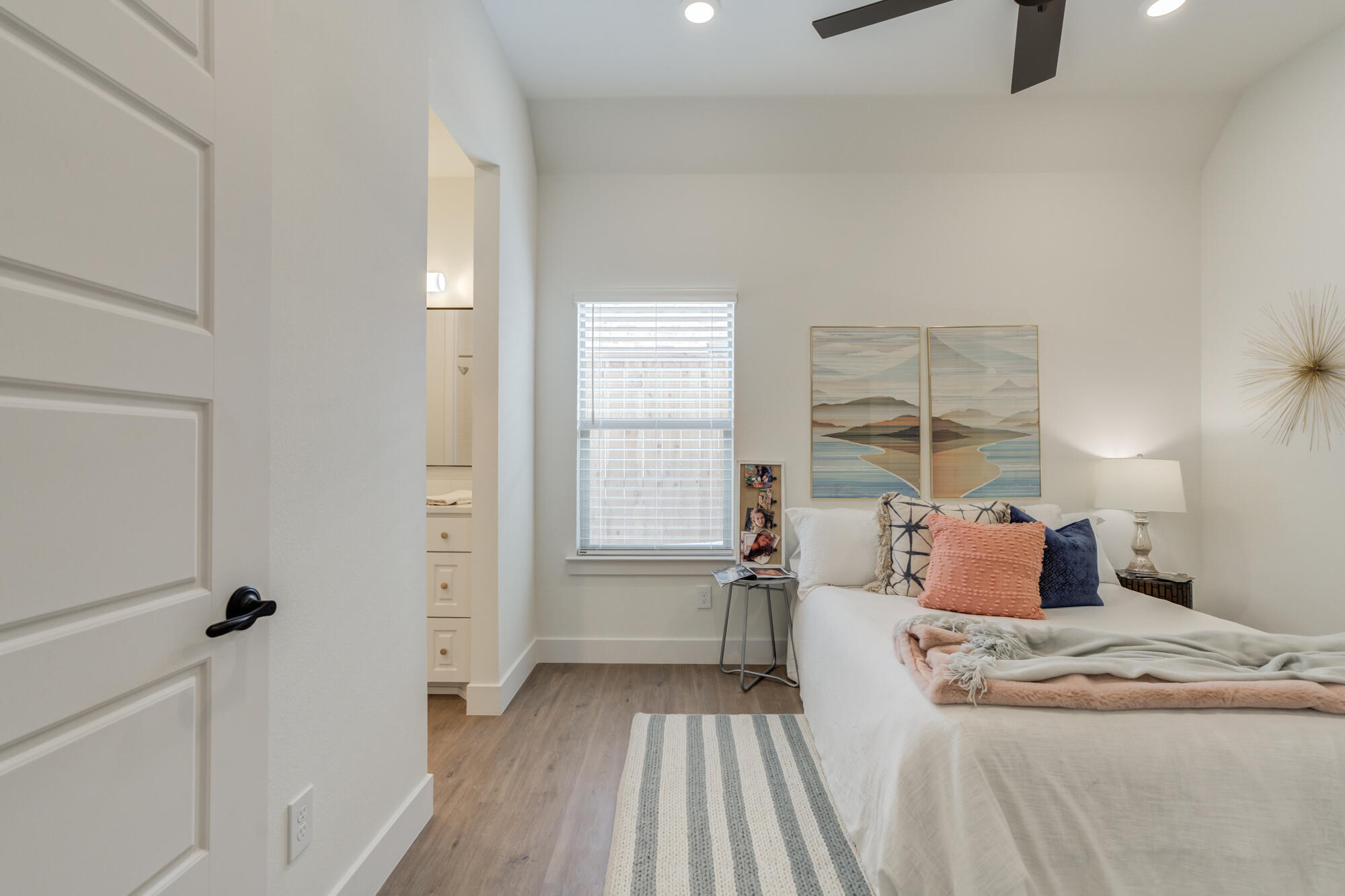 3608 144th Street Lubbock, TX 79423 - Photo 39 of 51 a bedroom with a bed and a large window