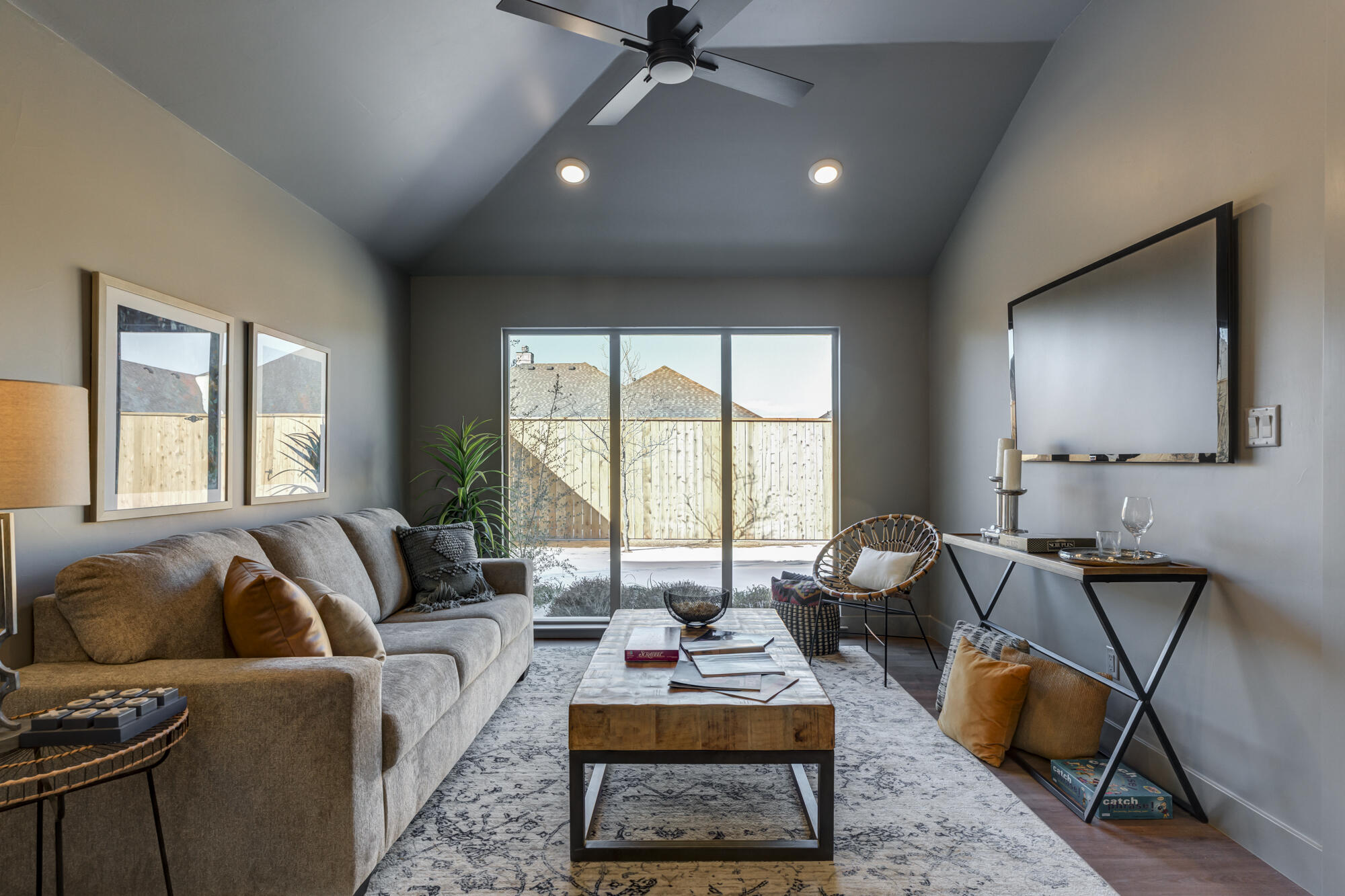 3608 144th Street Lubbock, TX 79423 - Photo 46 of 51 a living room with furniture and a flat screen tv