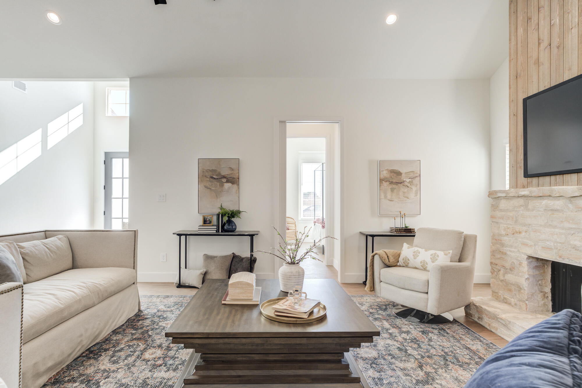 3608 144th Street Lubbock, TX 79423 - Photo 6 of 51 a living room with furniture a fireplace and a flat screen tv