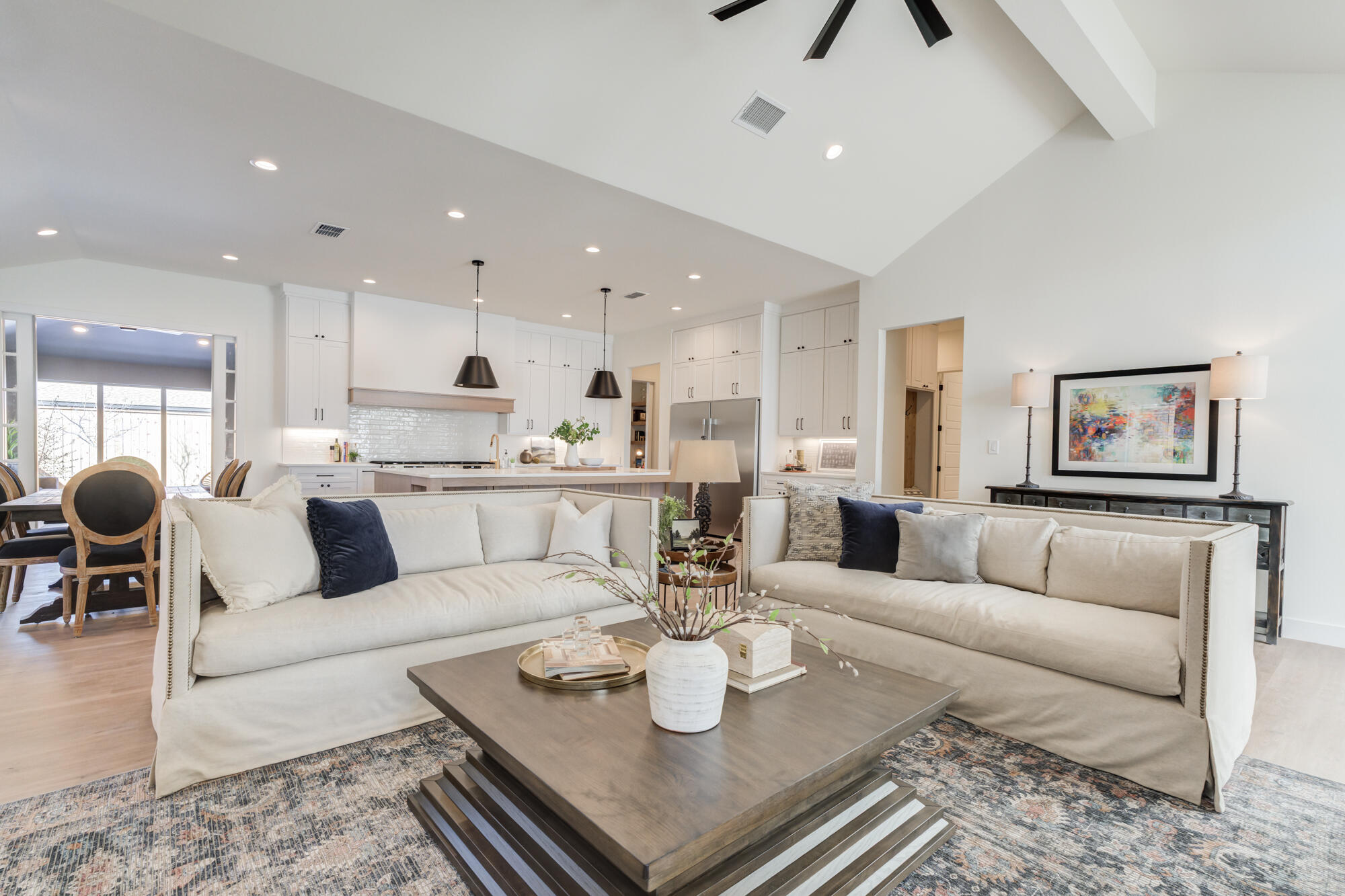 3608 144th Street Lubbock, TX 79423 - Photo 9 of 51 a living room with stainless steel appliances kitchen island granite countertop furniture and a view of kitchen