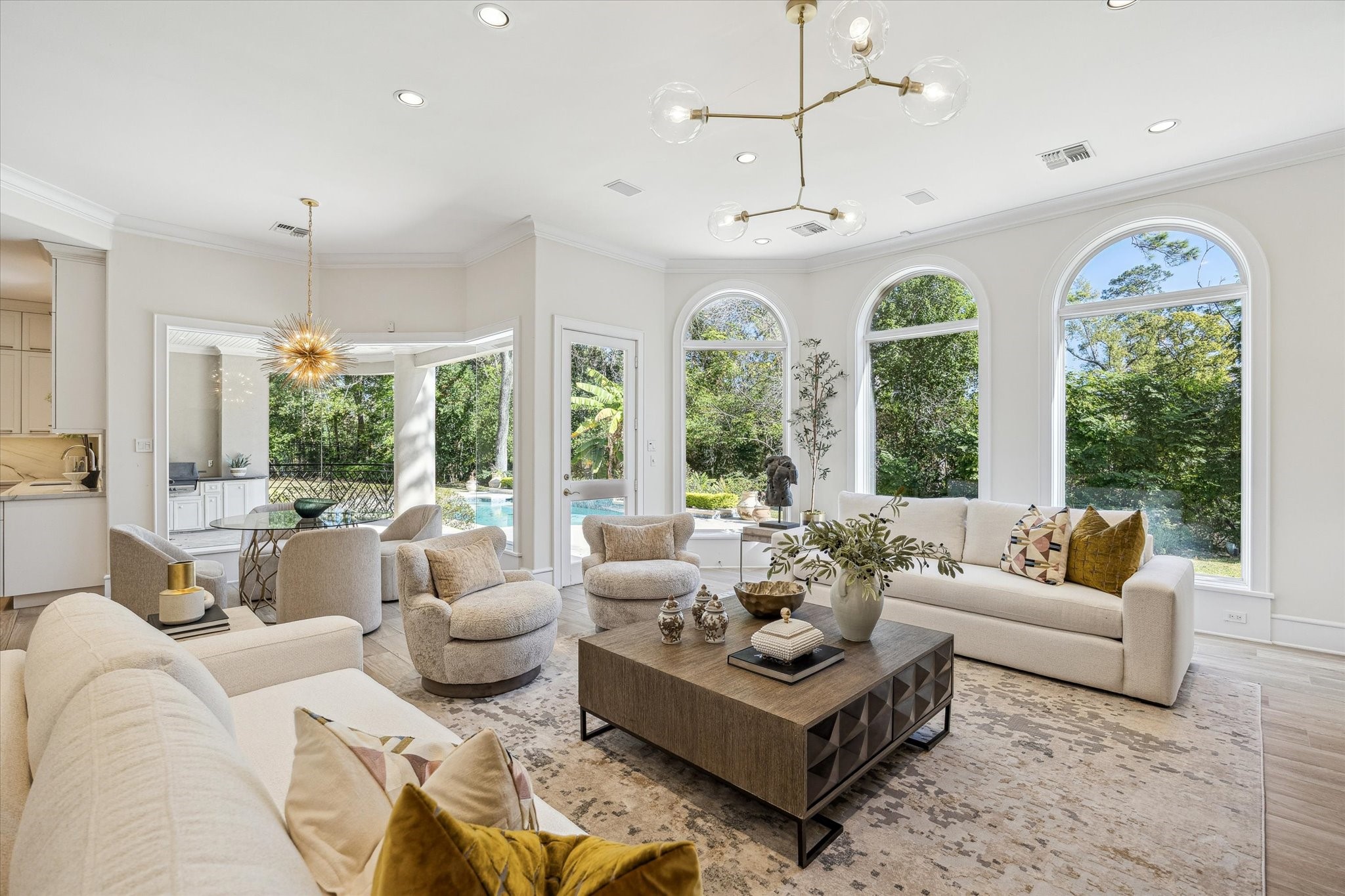 608 Little John Lane Houston, TX 77024 - Photo 17 of 46 With direct access to the covered
patio and backyard, this open-
concept space invites both relaxation
and entertaining. The breakfast area,
just steps away, overlooks the
serene pool. Natural light, refined
finishes, and effortless flow define
the space.