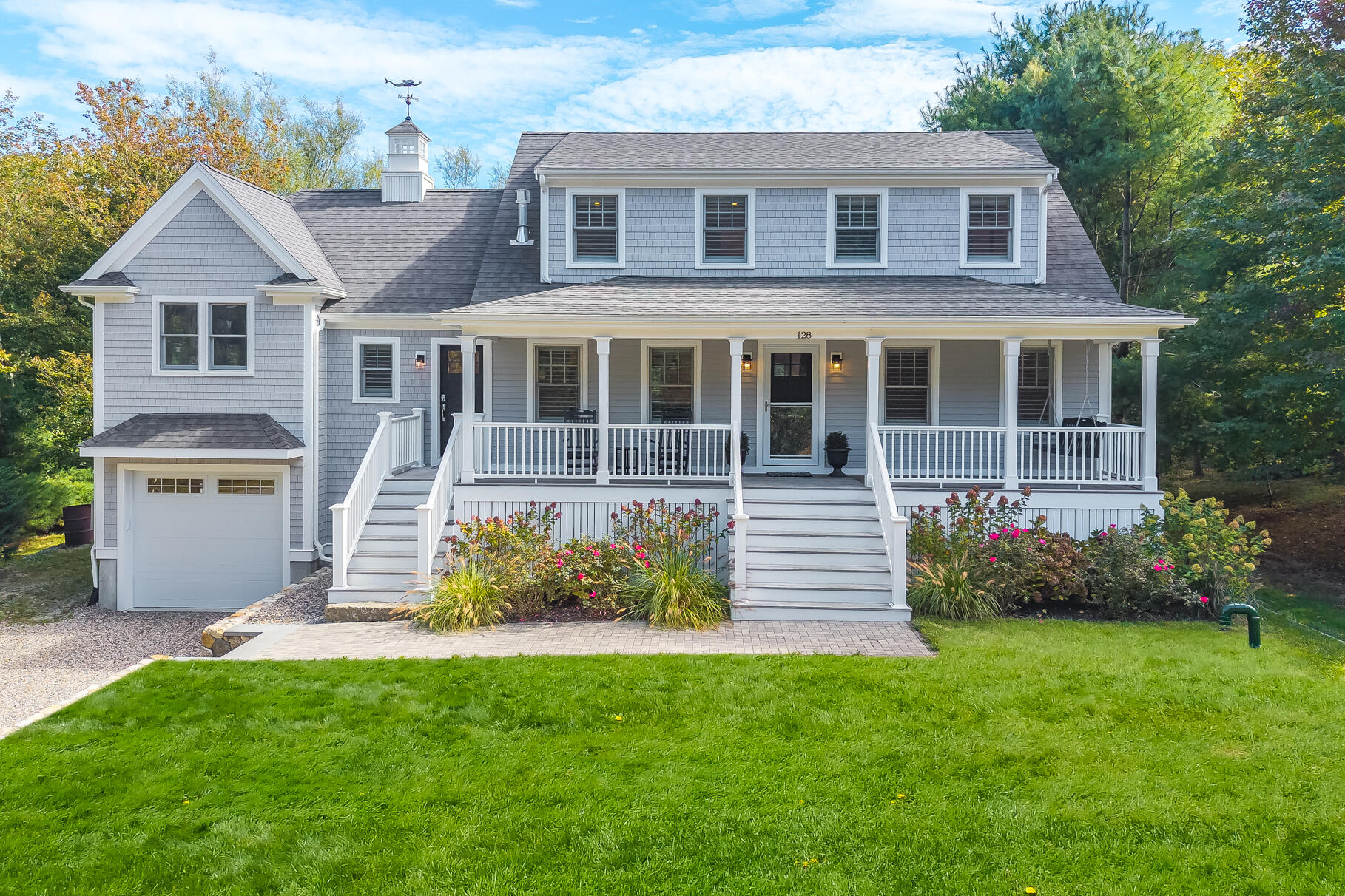 128 Uncle Percy's Road Mashpee, MA 02649 - Photo 2 of 45 a front view of a house with a garden and yard