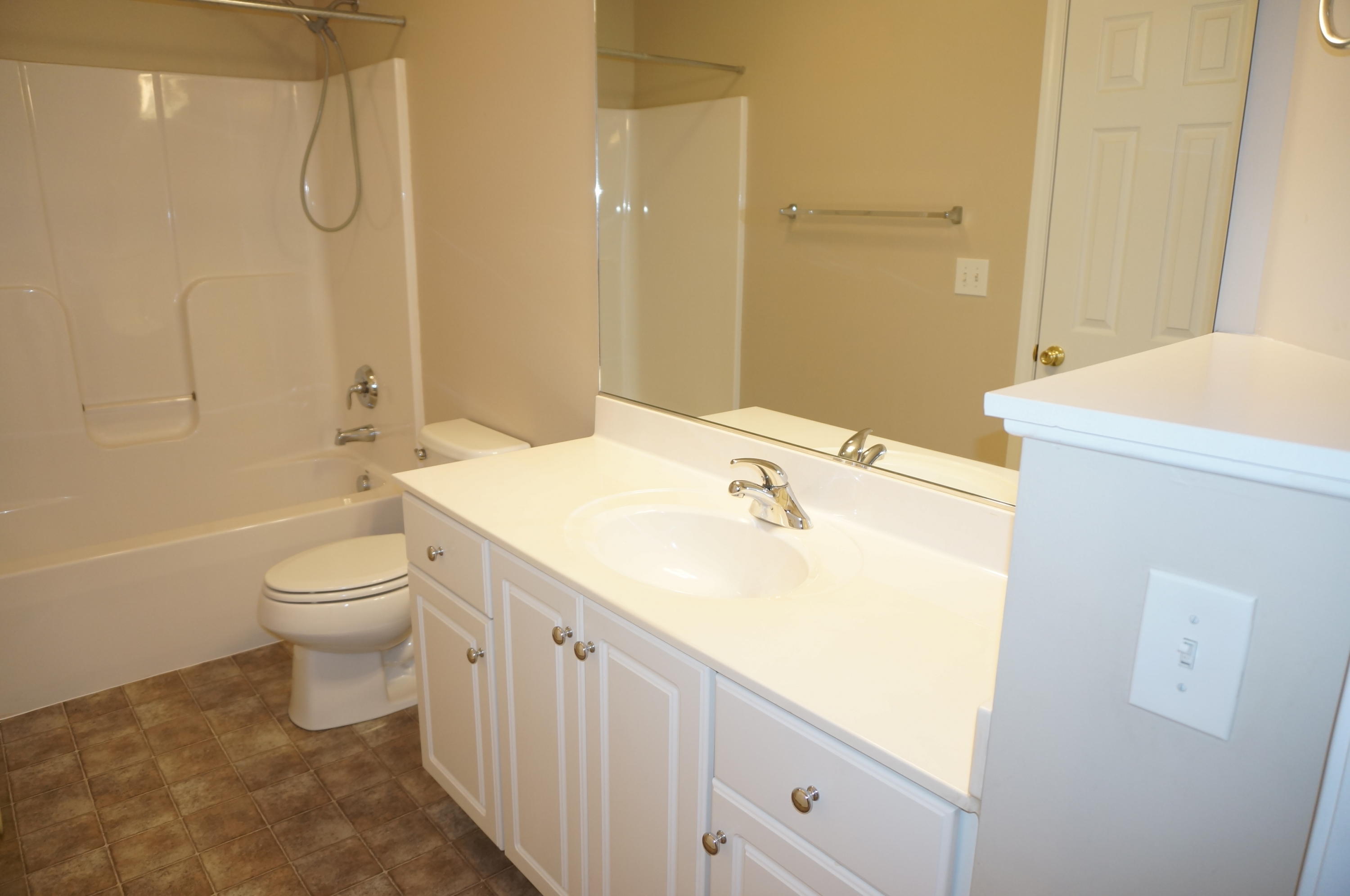 5734 North Fork Road Elliston, VA 24087 - Photo 23 of 27 a bathroom with a sink a toilet and shower