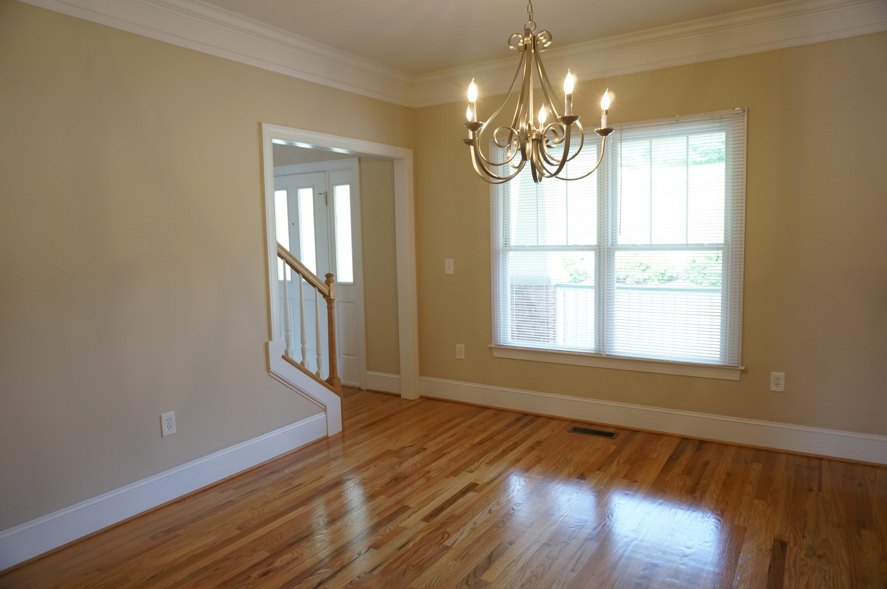 5734 North Fork Road Elliston, VA 24087 - Photo 6 of 27 a view of an empty room with wooden floor and a window