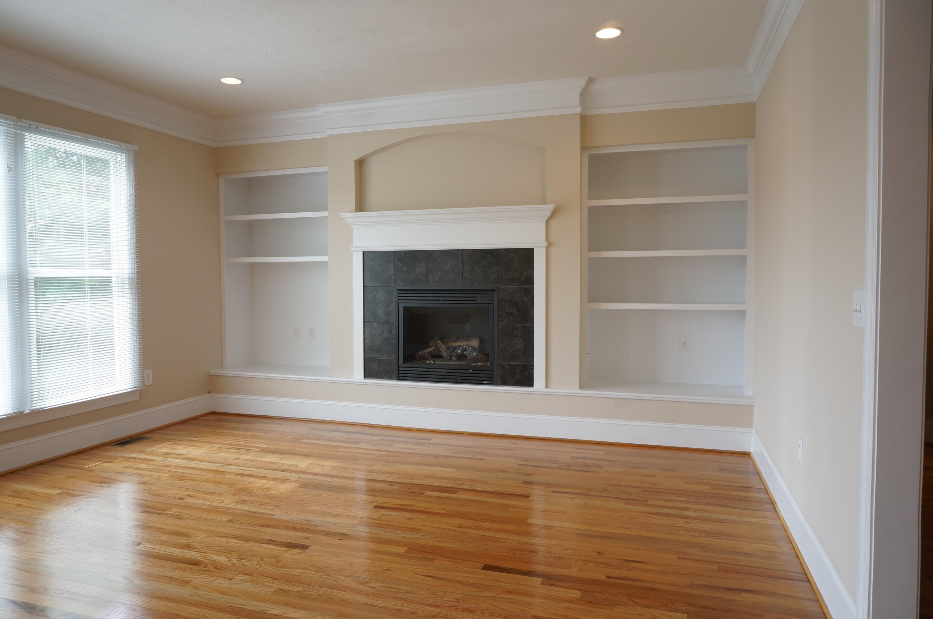 5734 North Fork Road Elliston, VA 24087 - Photo 8 of 27 a view of an empty room with a window and fireplace