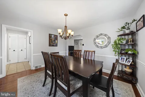 a view of a dining room and a table in a room