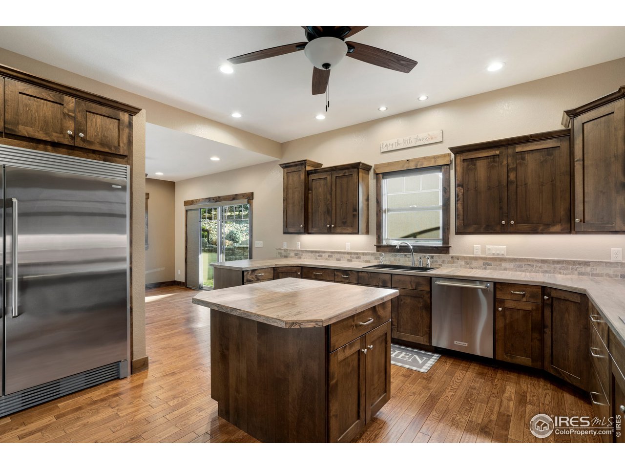 608 Riverside Court Greeley, CO 80634 - Photo 12 of 36 Large side by side Refrigerator/Freezer