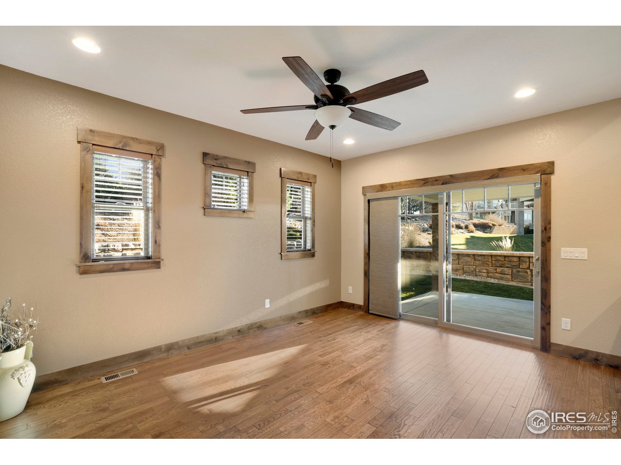 608 Riverside Court Greeley, CO 80634 - Photo 17 of 36 Formal dining to backyard