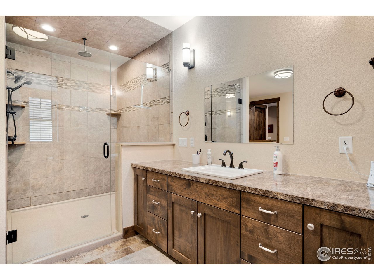 608 Riverside Court Greeley, CO 80634 - Photo 22 of 36 Enormous shower with multiple shower heads