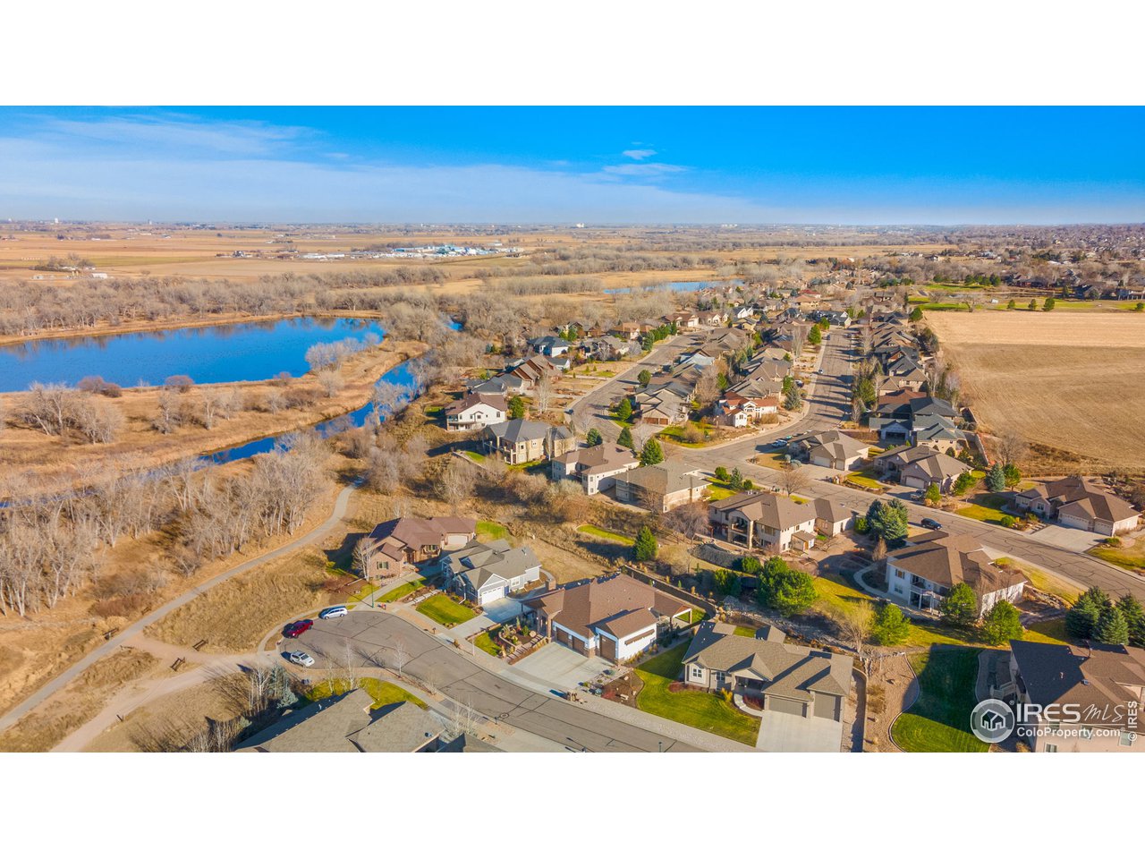 608 Riverside Court Greeley, CO 80634 - Photo 35 of 36 Great access to the Poudre River Trail and west facing views. Short commutes to Greeley, Windsor, Loveland and Ft Collins