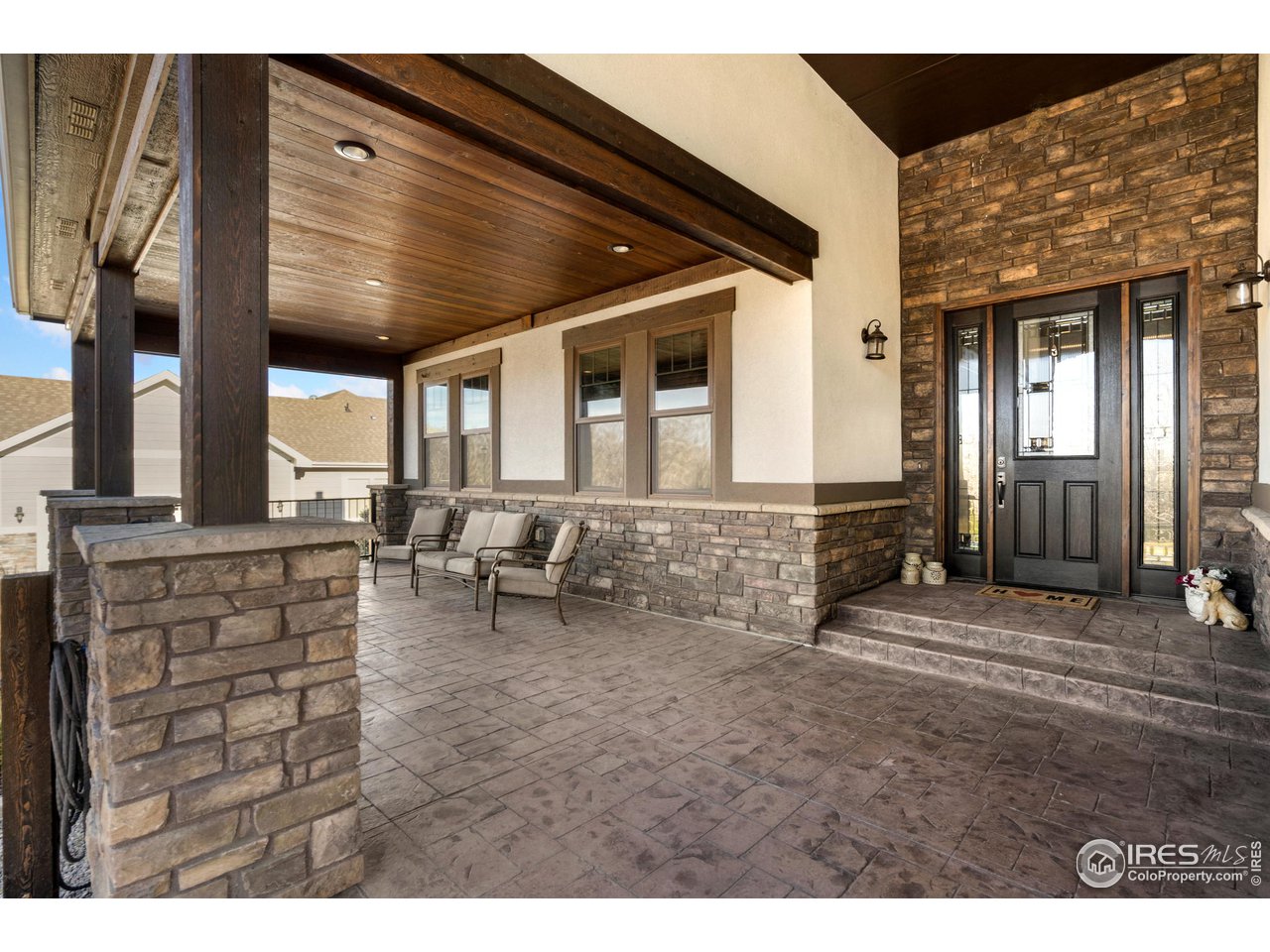 608 Riverside Court Greeley, CO 80634 - Photo 4 of 36 Spacious front proch with western views