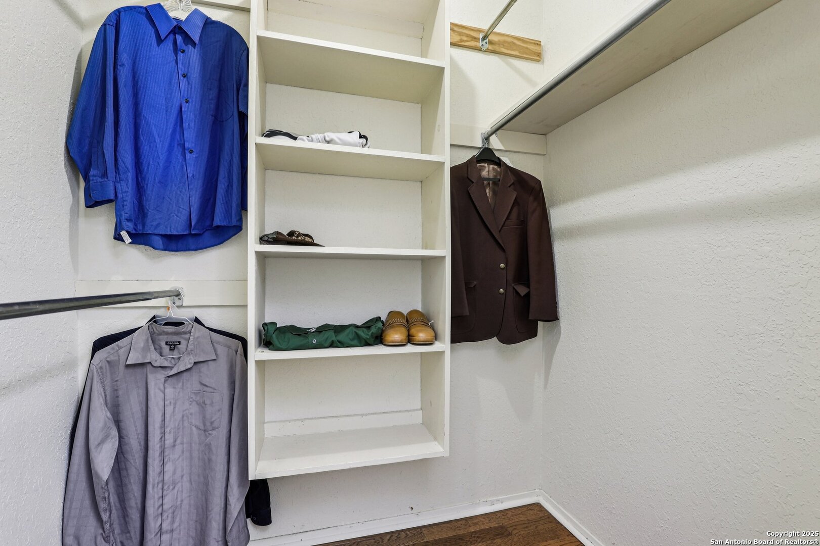 5817 Winding Ridge Drive Windcrest, TX 78239 - Photo 18 of 52 a view of walk in closet with clothes and shoes