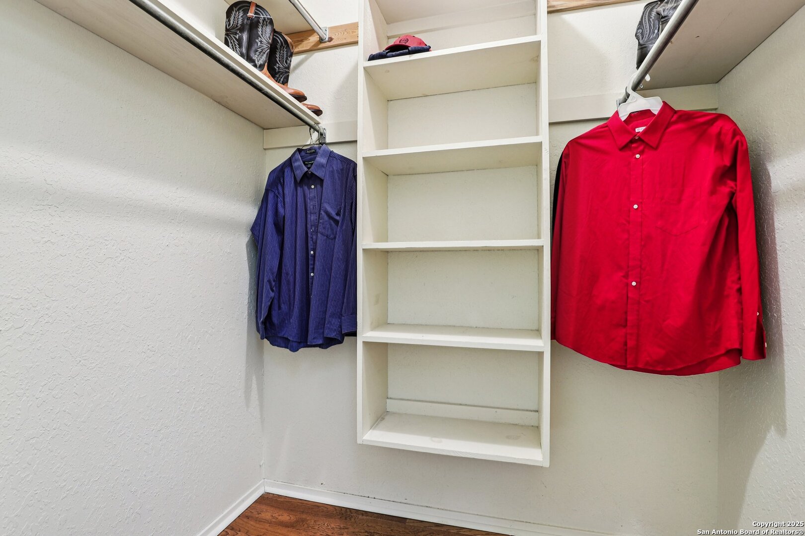 5817 Winding Ridge Drive Windcrest, TX 78239 - Photo 19 of 52 a view of walk in closet with clothes and shoes
