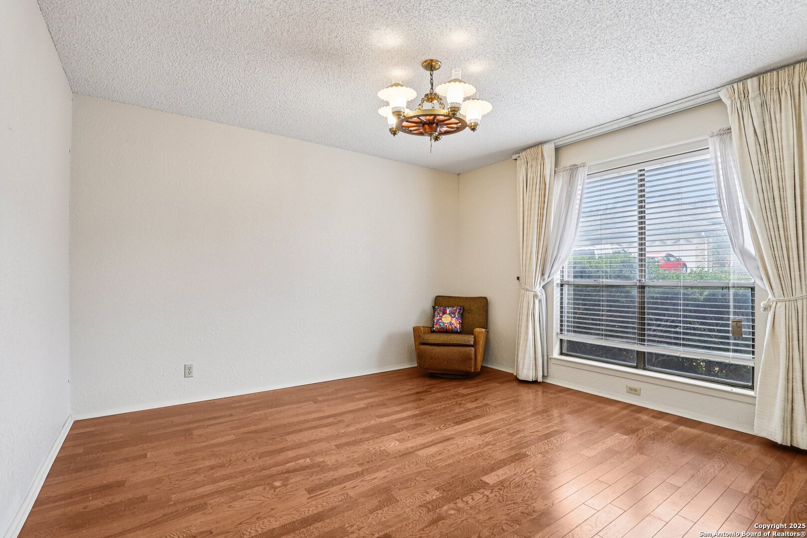 5817 Winding Ridge Drive Windcrest, TX 78239 - Photo 22 of 52 a view of an empty room with a window