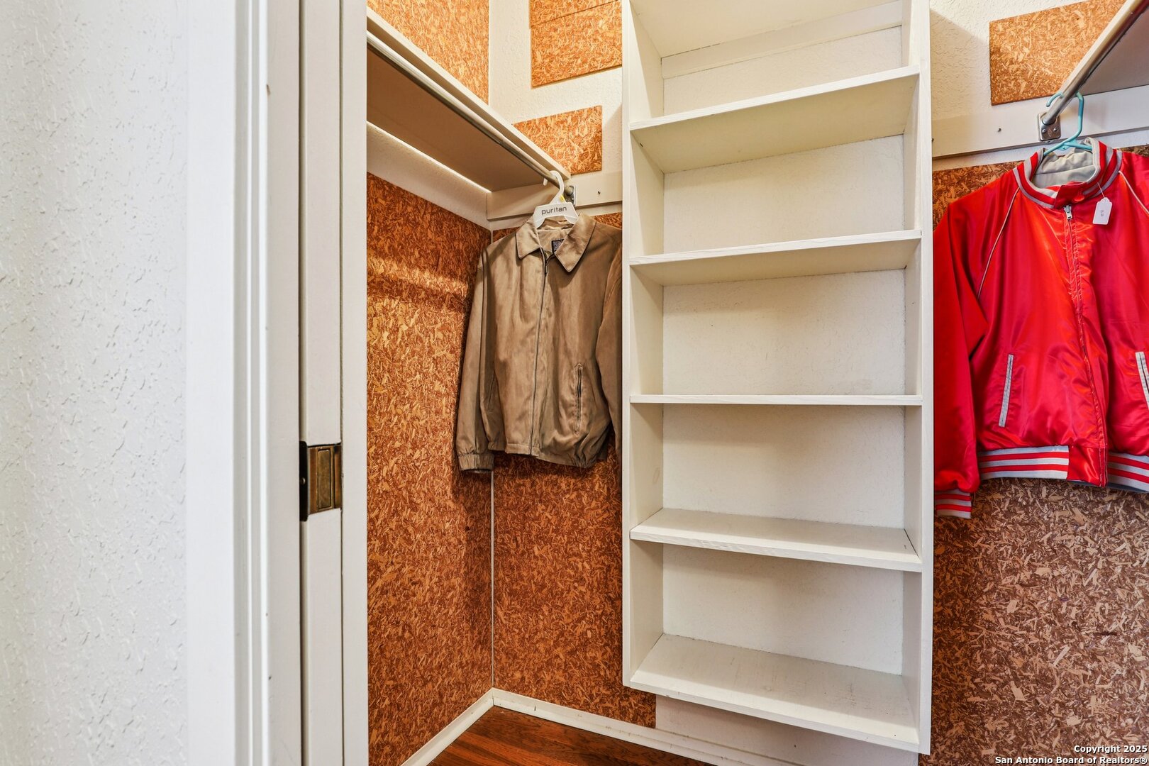 5817 Winding Ridge Drive Windcrest, TX 78239 - Photo 24 of 52 a view of walk in closet with clothes