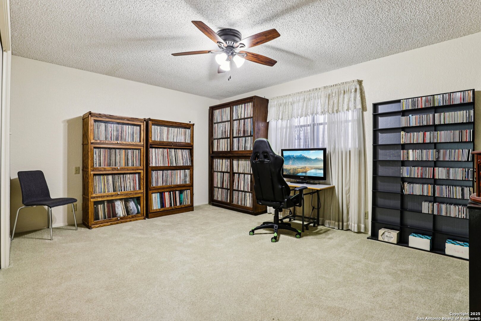 5817 Winding Ridge Drive Windcrest, TX 78239 - Photo 25 of 52 a view of a livingroom with workspace and a couch