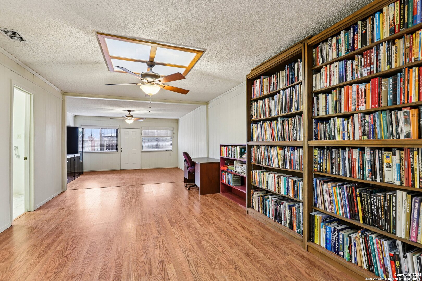 5817 Winding Ridge Drive Windcrest, TX 78239 - Photo 37 of 52 a view of livingroom with furniture and book shelf