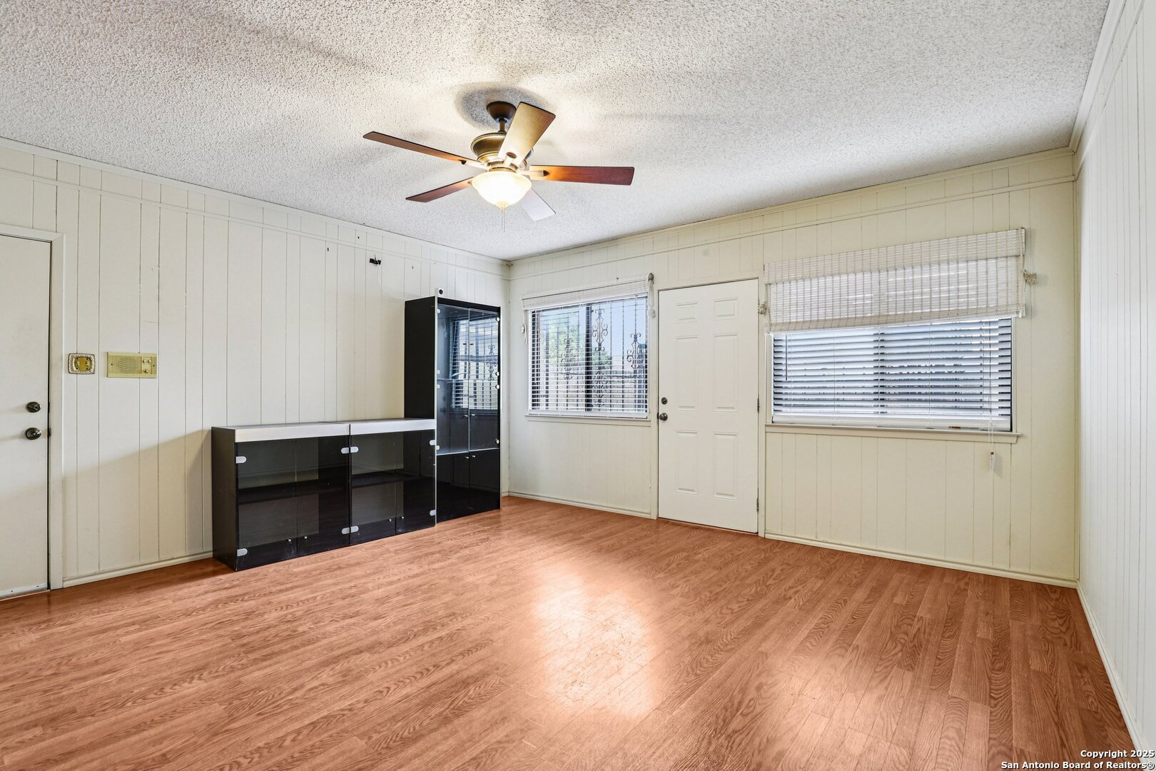5817 Winding Ridge Drive Windcrest, TX 78239 - Photo 41 of 52 a view of empty room with wooden floor and fan