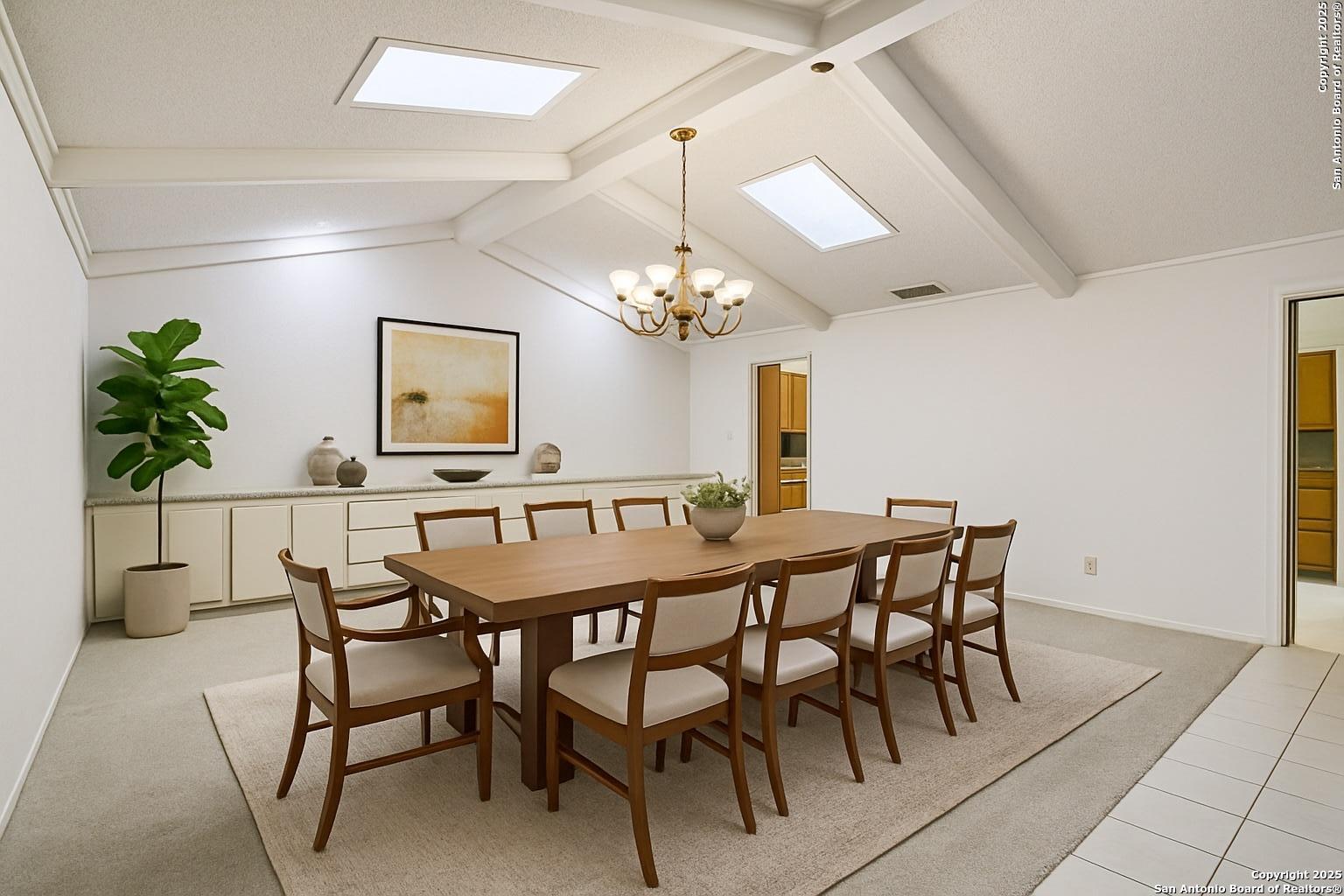 5817 Winding Ridge Drive Windcrest, TX 78239 - Photo 7 of 52 a view of a dining room with furniture and chandelier