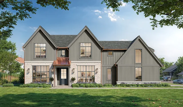 a front view of house with yard and green space