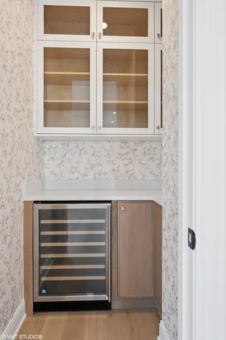 a bathroom with a sink and a window